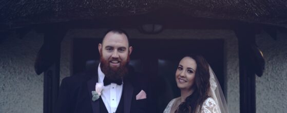 Shauna and Kevin holding each other at sunset on Lusty Beg Island, with the Fermanagh lakes in the background – an intimate moment from their wedding film.