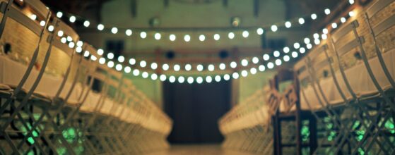 Dramatic wedding ceremony venue with string lights at Domaine de Roquefeuille Marseille, intimate outdoor setup with elegant lighting under stars Destination Wedding Videographer Provence Marseille France